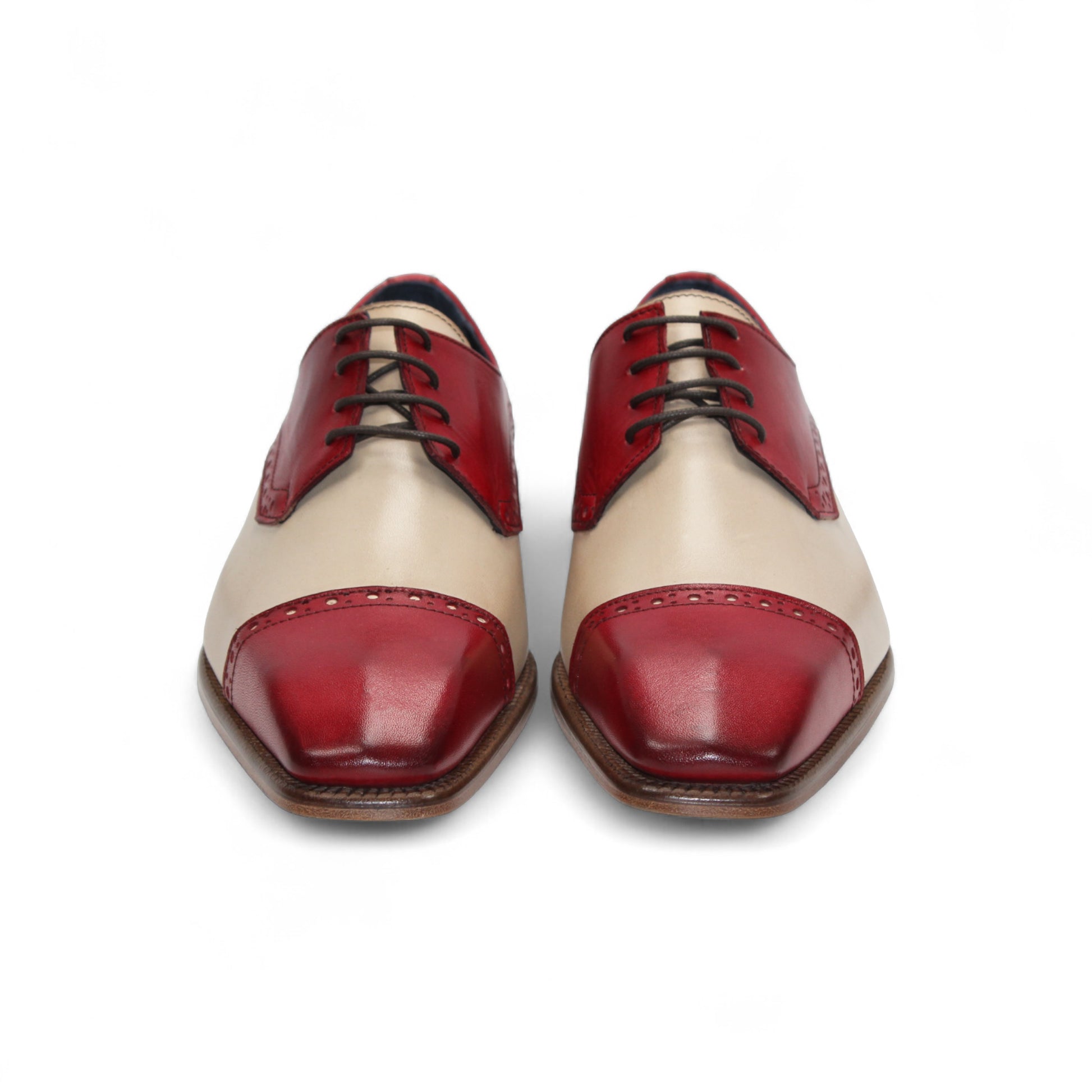The Duca Di Matiste Lombardi (Red/Beige) is a two-tone oxford by Duca Di Matiste, crafted in Italy from fine leather with a beige body and red accents, brogue detailing, and a low wooden heel.