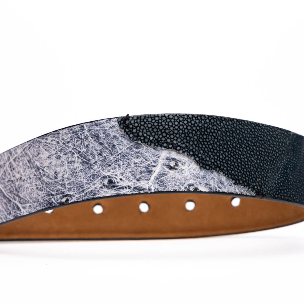 A Marco Di Milano Lucca Belt in Newspaper/Black, crafted with genuine leather and a distinctive texture, is wrapped around another belt to highlight the refined elegance of these luxury accessories.