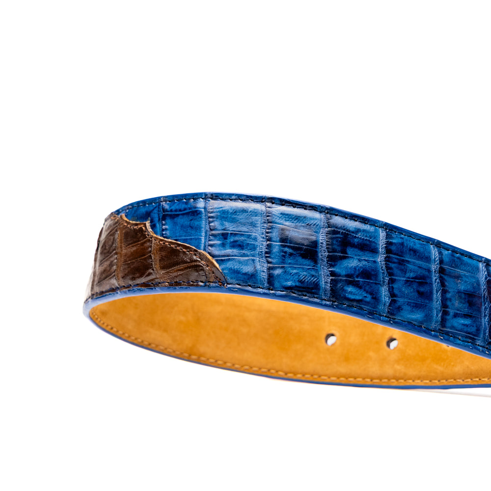 Introducing the Luciano Belt Navy / Brown by Marco Di Milano, a handcrafted luxury belt featuring an exotic crocodile-patterned leather in striking blue and dark brown sections with a refined silver buckle, elegantly coiled on a white background.