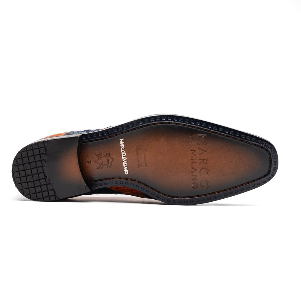 The Marco Di Milano Luciano Blue / Brandy men's dress shoes feature textured leather in orange and navy, with one shoe upright and the other on its side to display the sole.