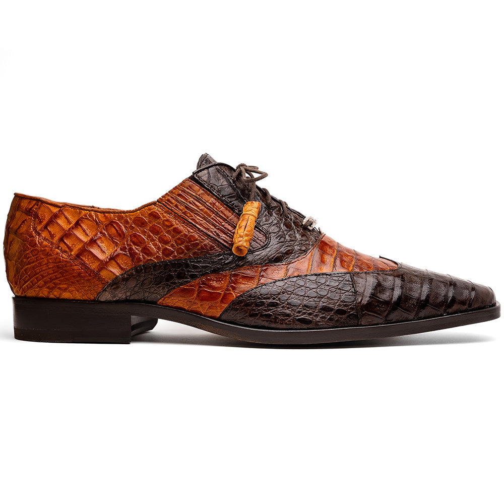 A pair of Marco Di Milano Luciano Brown / Cognac dress shoes with a pointed toe, lace-up closure, and embossed sole branding—ideal for elevating your luxury men's footwear collection.