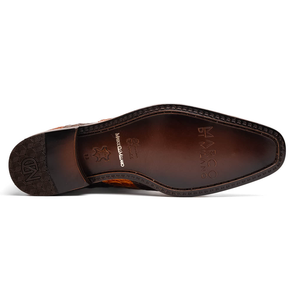 A pair of Marco Di Milano Luciano Brown / Cognac dress shoes with a pointed toe, lace-up closure, and embossed sole branding—ideal for elevating your luxury men's footwear collection.