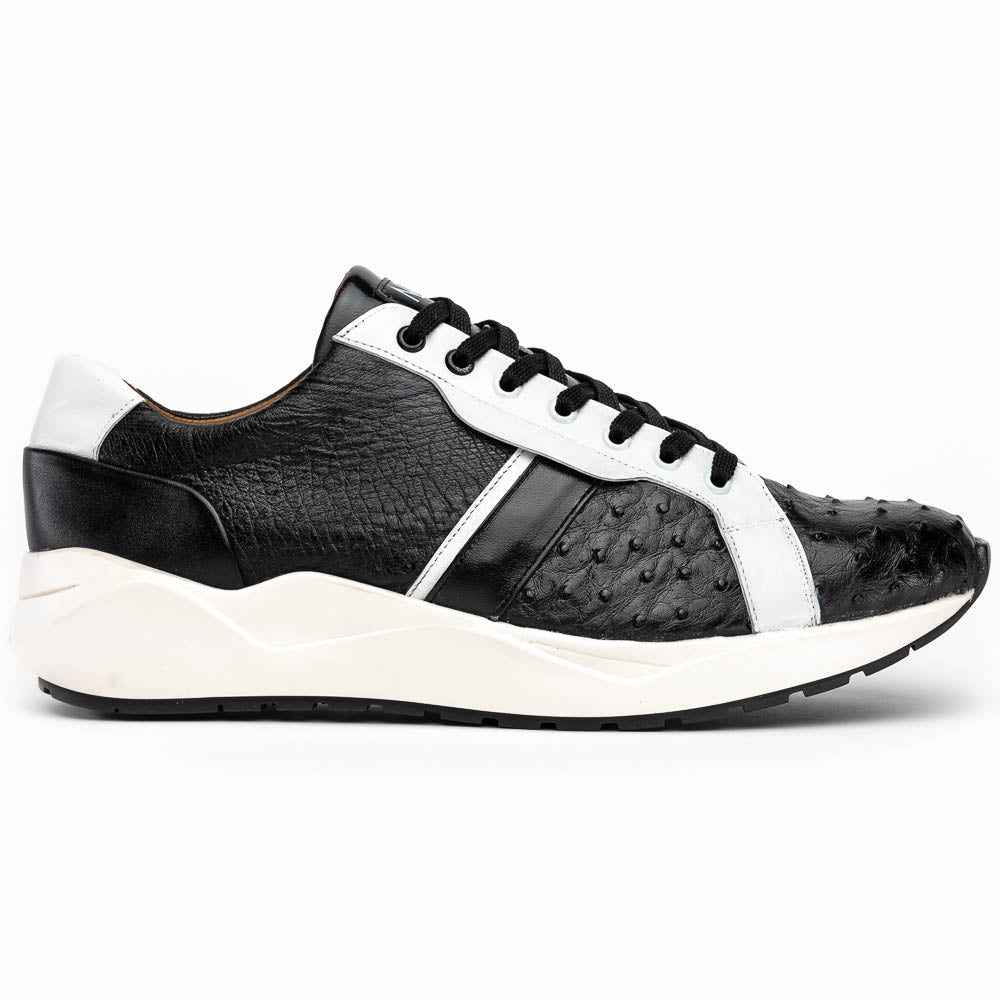 The Marco Di Milano Lyon II Black / White sneakers feature textured leather uppers, black laces, and rubber soles, displayed against a plain white background.