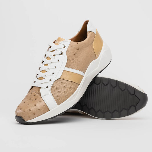 The Marco Di Milano Lyon II Orix / White sneakers feature beige and white ostrich quill-textured uppers and black rubber soles—an ideal choice for those seeking luxury footwear.