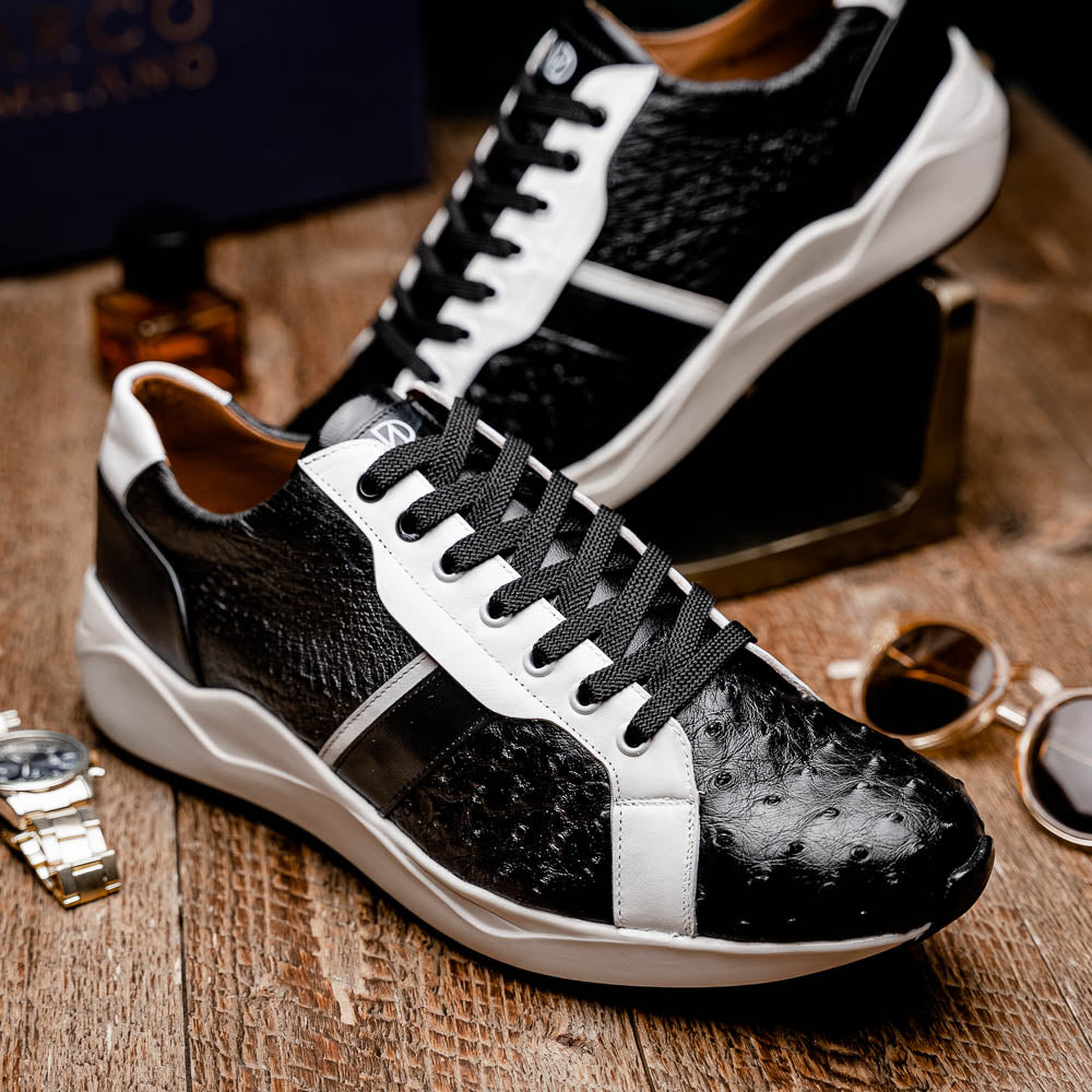 The Marco Di Milano Lyon II Black / White sneakers feature textured leather uppers, black laces, and rubber soles, displayed against a plain white background.