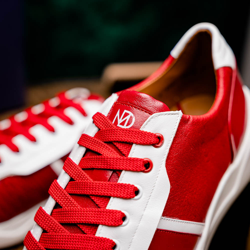 The Marco Di Milano Lyon II Red / White features hand-painted red and white leather, textured uppers, red laces, and white soles, shown on a white background.