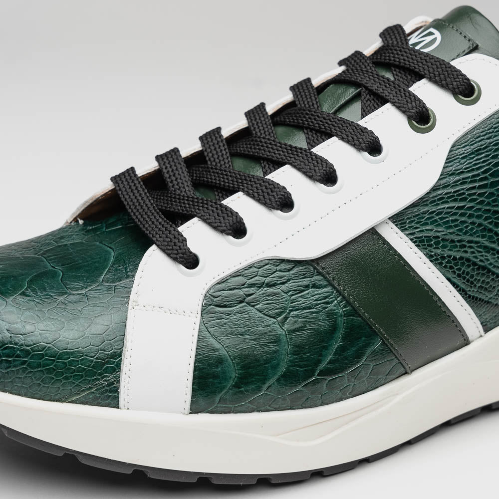 The Marco Di Milano Lyon Green / White sneakers feature green and white genuine ostrich leather with texture, black laces, and white rubber soles—one shoe stands upright while the other leans against it.
