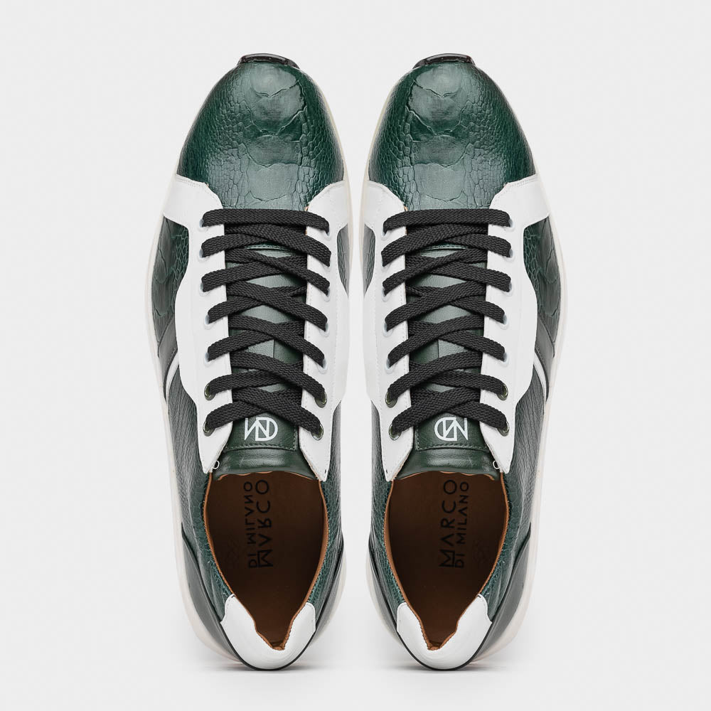 The Marco Di Milano Lyon Green / White sneakers feature green and white genuine ostrich leather with texture, black laces, and white rubber soles—one shoe stands upright while the other leans against it.