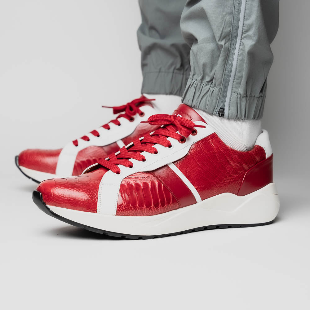 The Marco Di Milano Lyon Red / White are luxury low-top sneakers featuring a hand-painted finish, textured leather, white soles, red laces, and black tread, showcased on a plain white background.