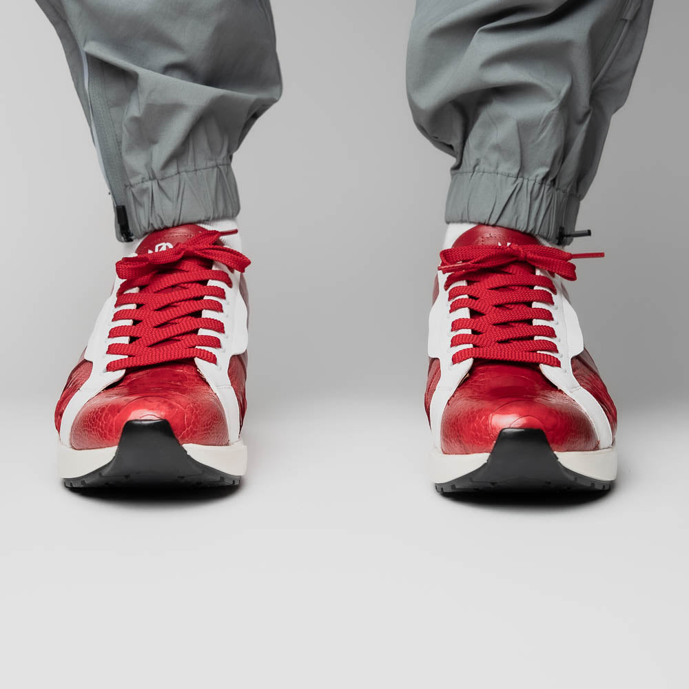 The Marco Di Milano Lyon Red / White are luxury low-top sneakers featuring a hand-painted finish, textured leather, white soles, red laces, and black tread, showcased on a plain white background.