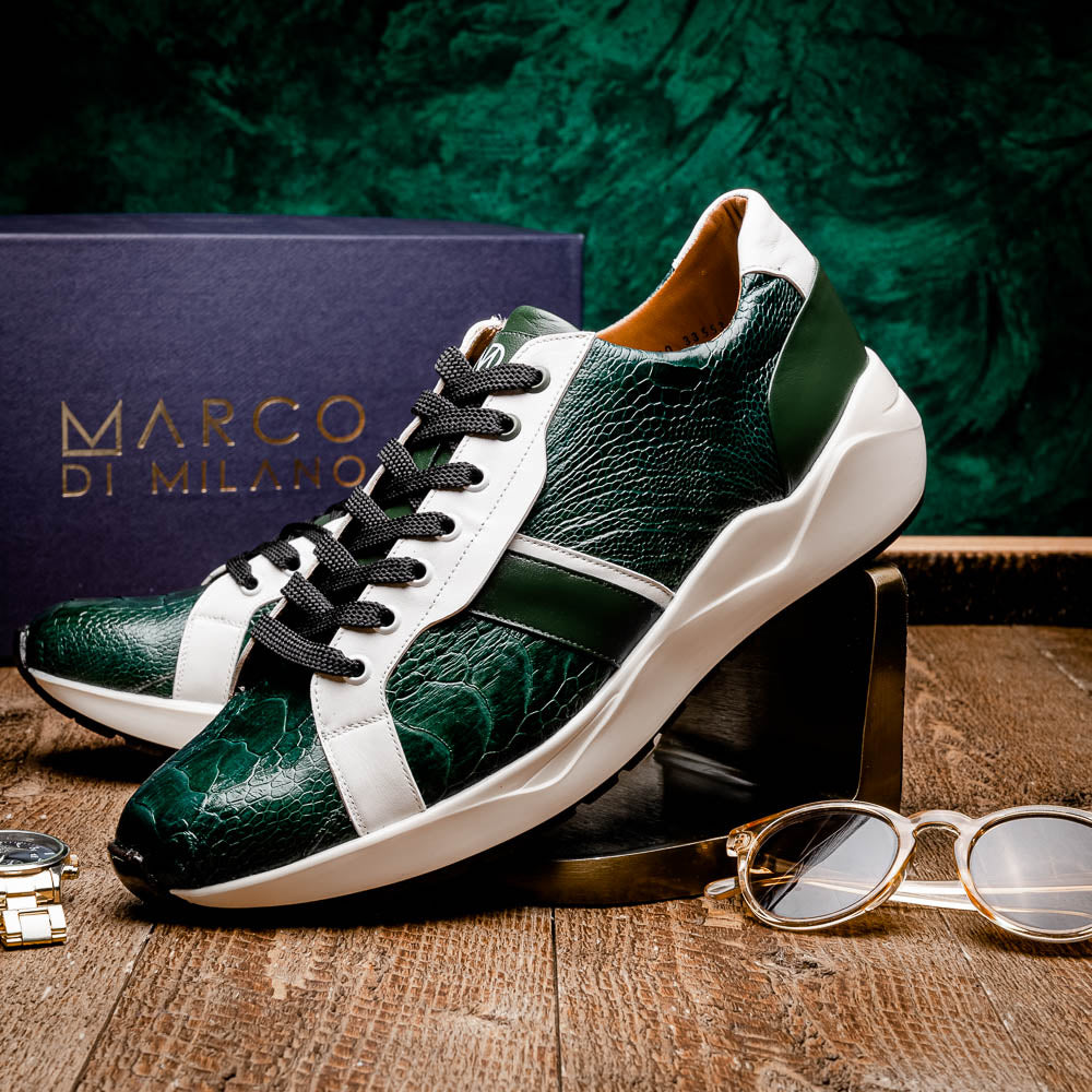 The Marco Di Milano Lyon Green / White sneakers feature green and white genuine ostrich leather with texture, black laces, and white rubber soles—one shoe stands upright while the other leans against it.