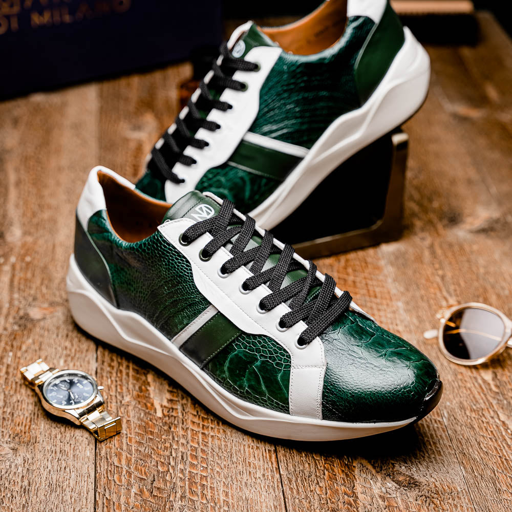 The Marco Di Milano Lyon Green / White sneakers feature green and white genuine ostrich leather with texture, black laces, and white rubber soles—one shoe stands upright while the other leans against it.