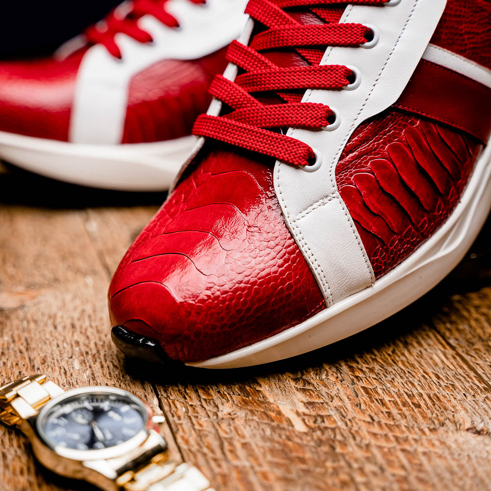 The Marco Di Milano Lyon Red / White are luxury low-top sneakers featuring a hand-painted finish, textured leather, white soles, red laces, and black tread, showcased on a plain white background.