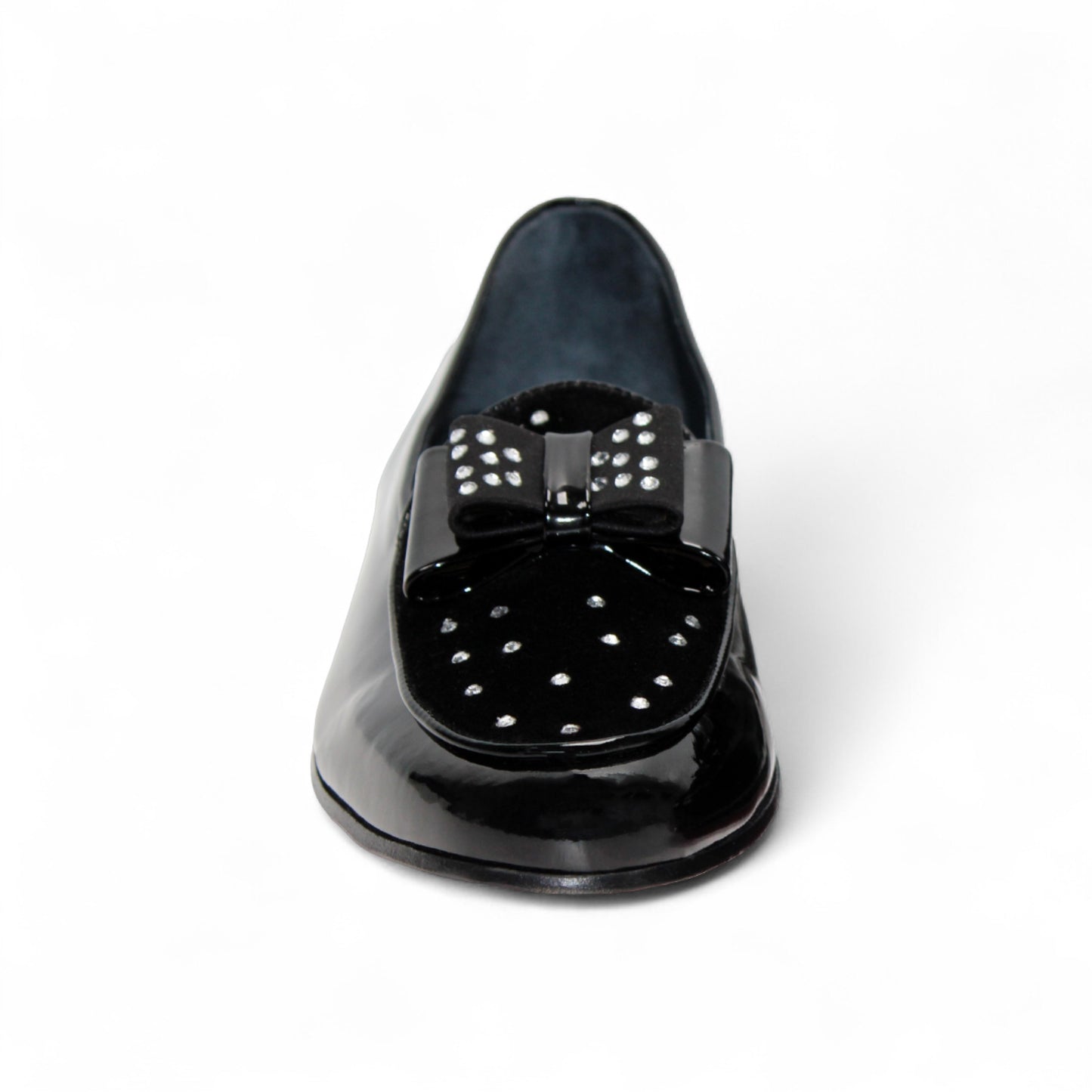 The Duca Maratea Black by Duca Di Matiste is a black patent leather loafer with a low heel, suede strap, and metal studs, highlighting fine Italian craftsmanship against a white background.