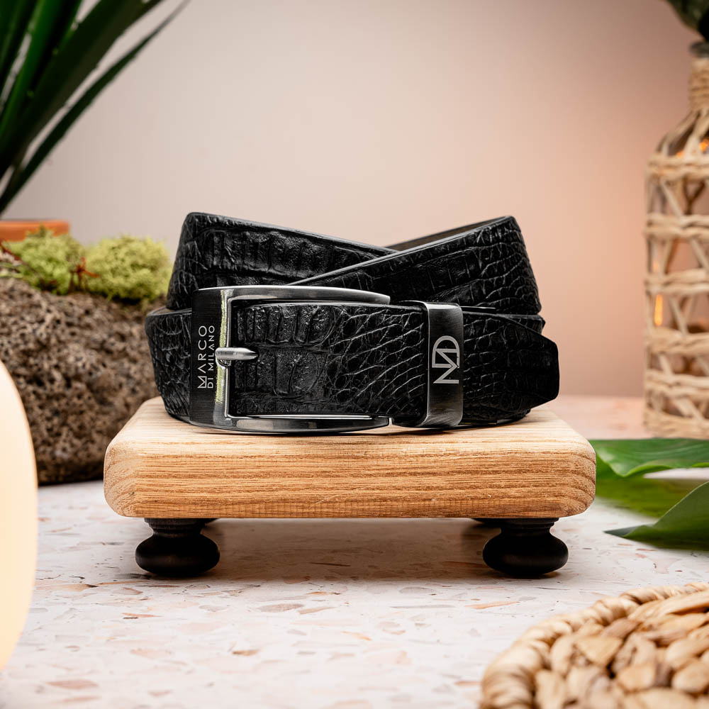 The Riccardo Belt Black by Marco Di Milano features a fuscus-belly crocodile pattern, silver logo buckle, and genuine exotic leather—perfect for refined style.