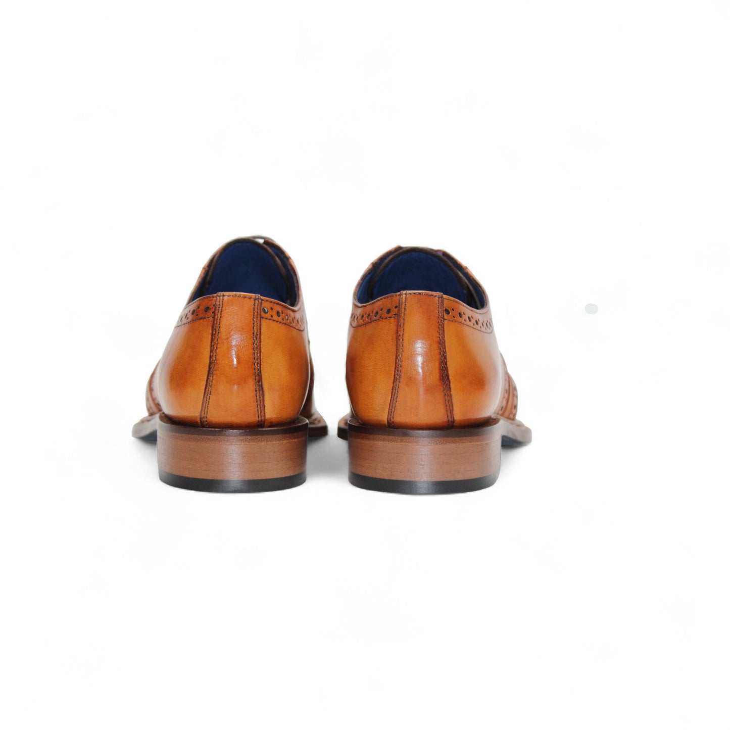 The Emilio Franco Marco Gold is a tan genuine leather dress shoe with brogue detailing, low heel, and laces, shown in profile on a white background.