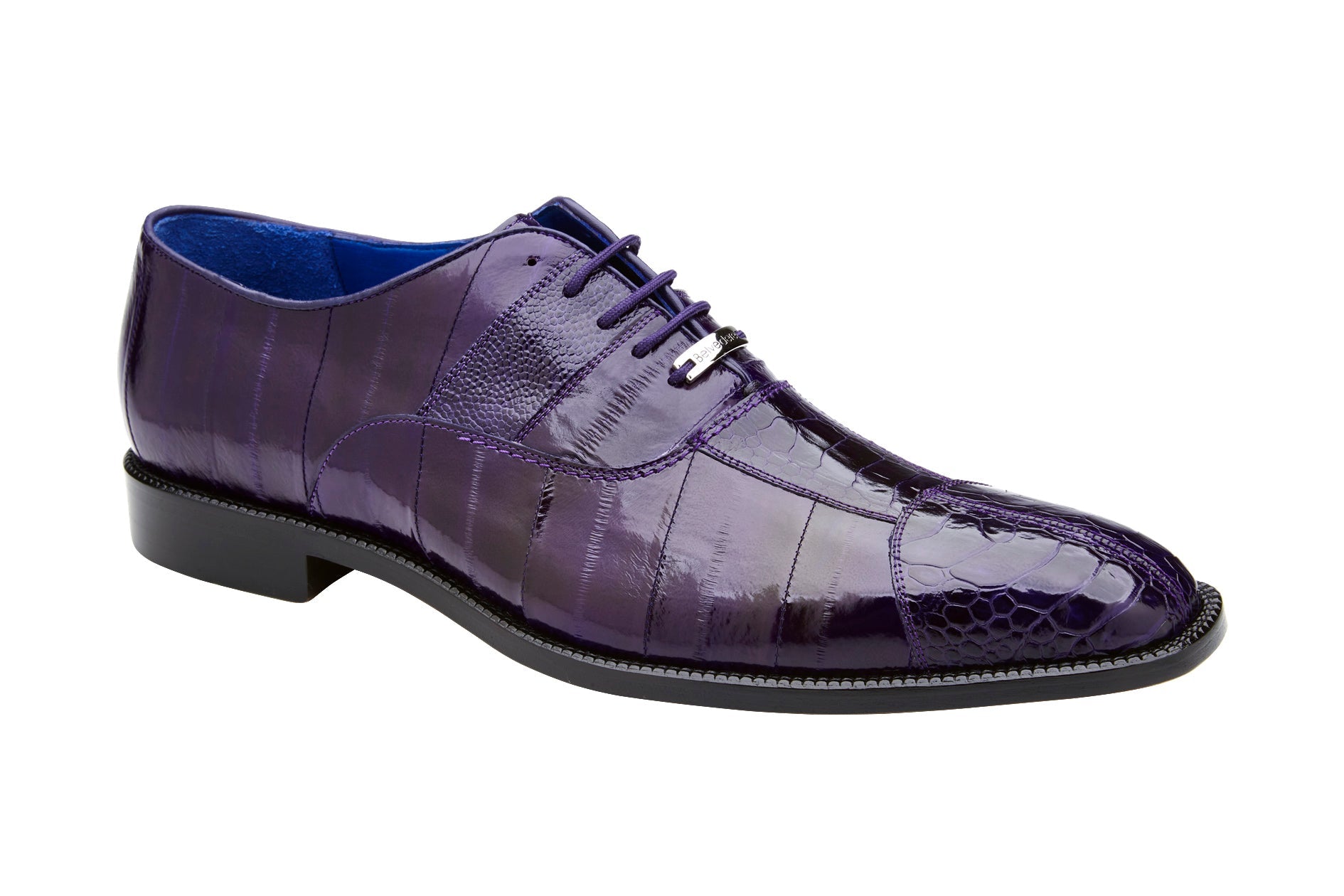The Belvedere - Mare is a sleek purple dress shoe made from genuine ostrich and eel leather, featuring laces and a low heel.