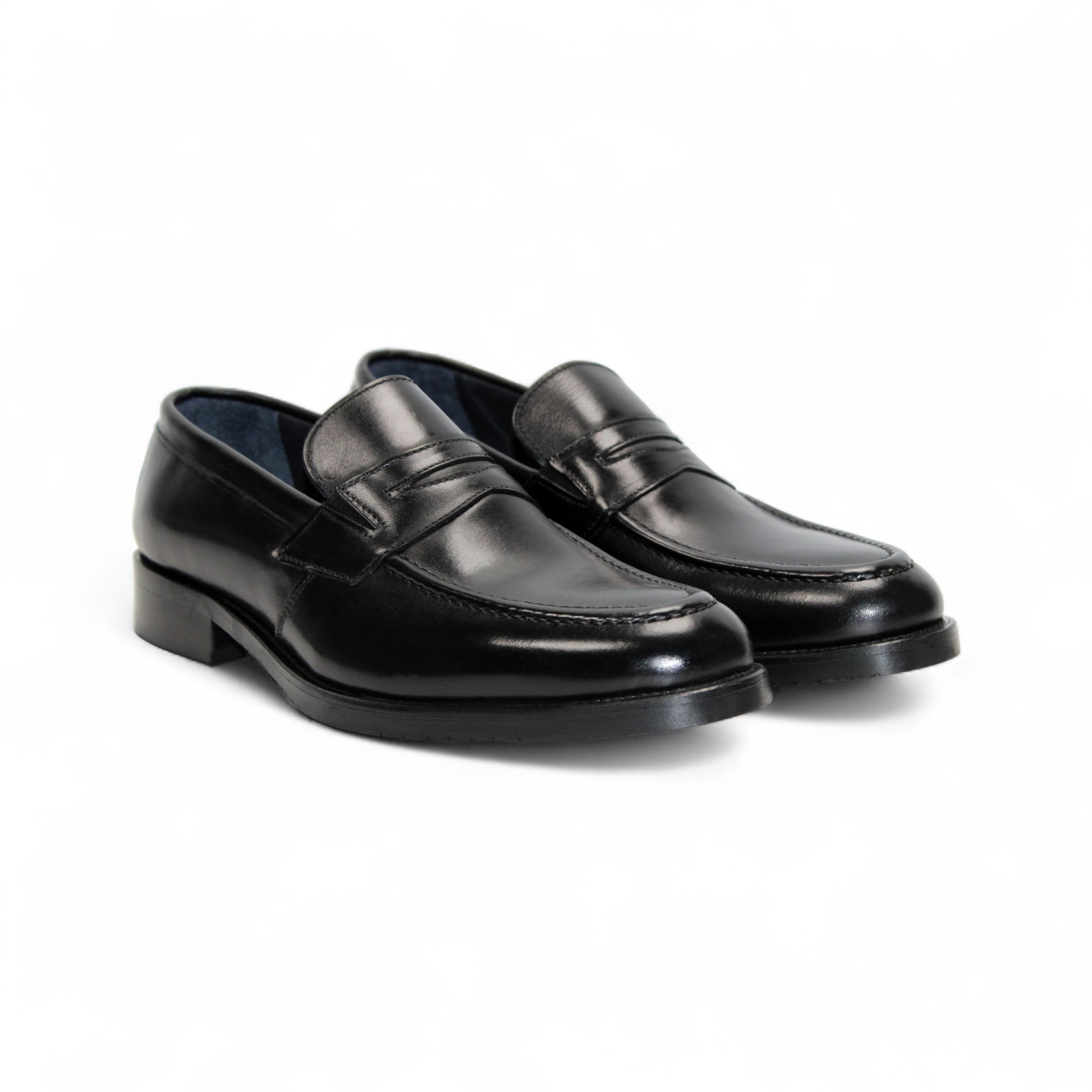 The Firmani Mark Black loafer by Firmani, crafted from Italian leather, is shown in a left side profile on a plain white background—an elegant option in men’s dress shoes.