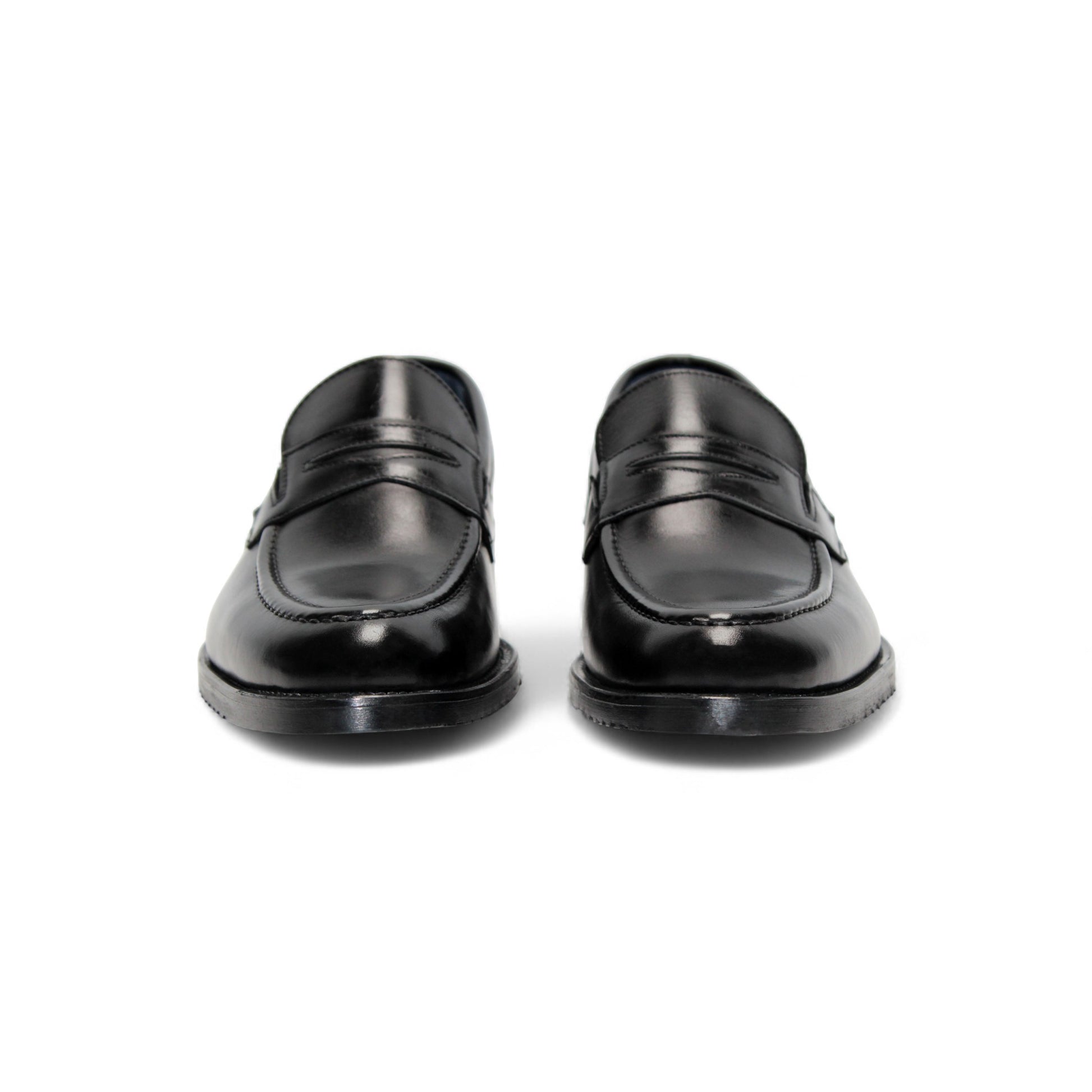 The Firmani Mark Black loafer by Firmani, crafted from Italian leather, is shown in a left side profile on a plain white background—an elegant option in men’s dress shoes.