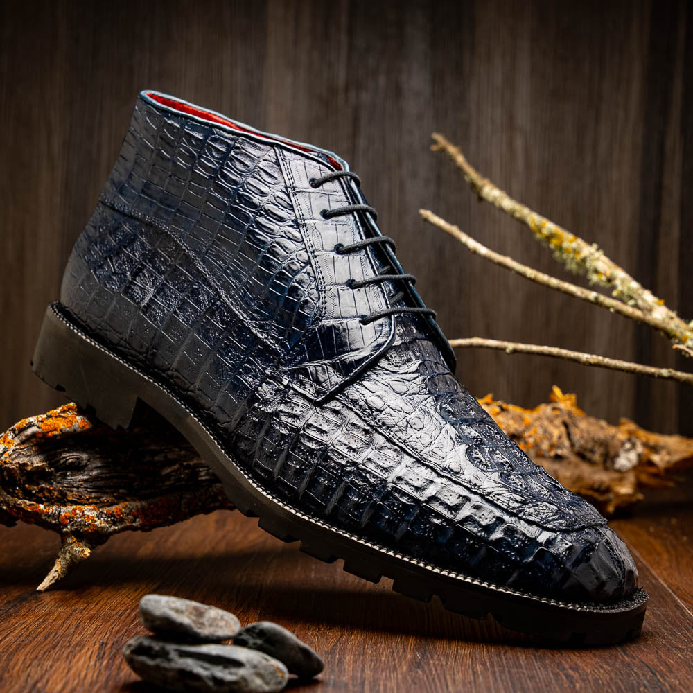 The Martinelli Navy by Marco Di Milano are genuine caiman crocodile boots in dark blue with a lace-up design and rugged black soles—perfect for men who love exotic footwear.