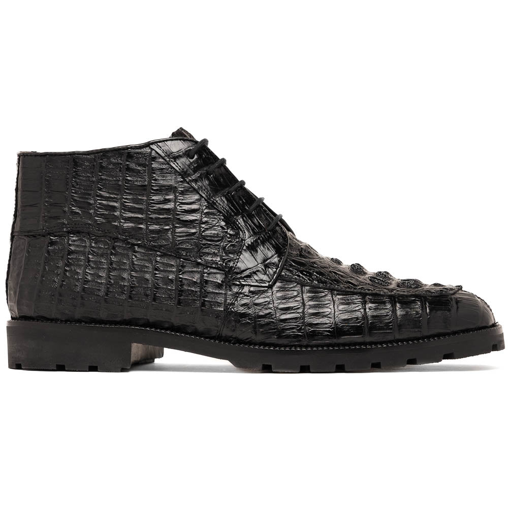 The Marco Di Milano Martinelli Black boots feature crocodile-patterned leather and thick rubber soles—one upright, one sideways to show the tread—for standout men's exotic footwear.