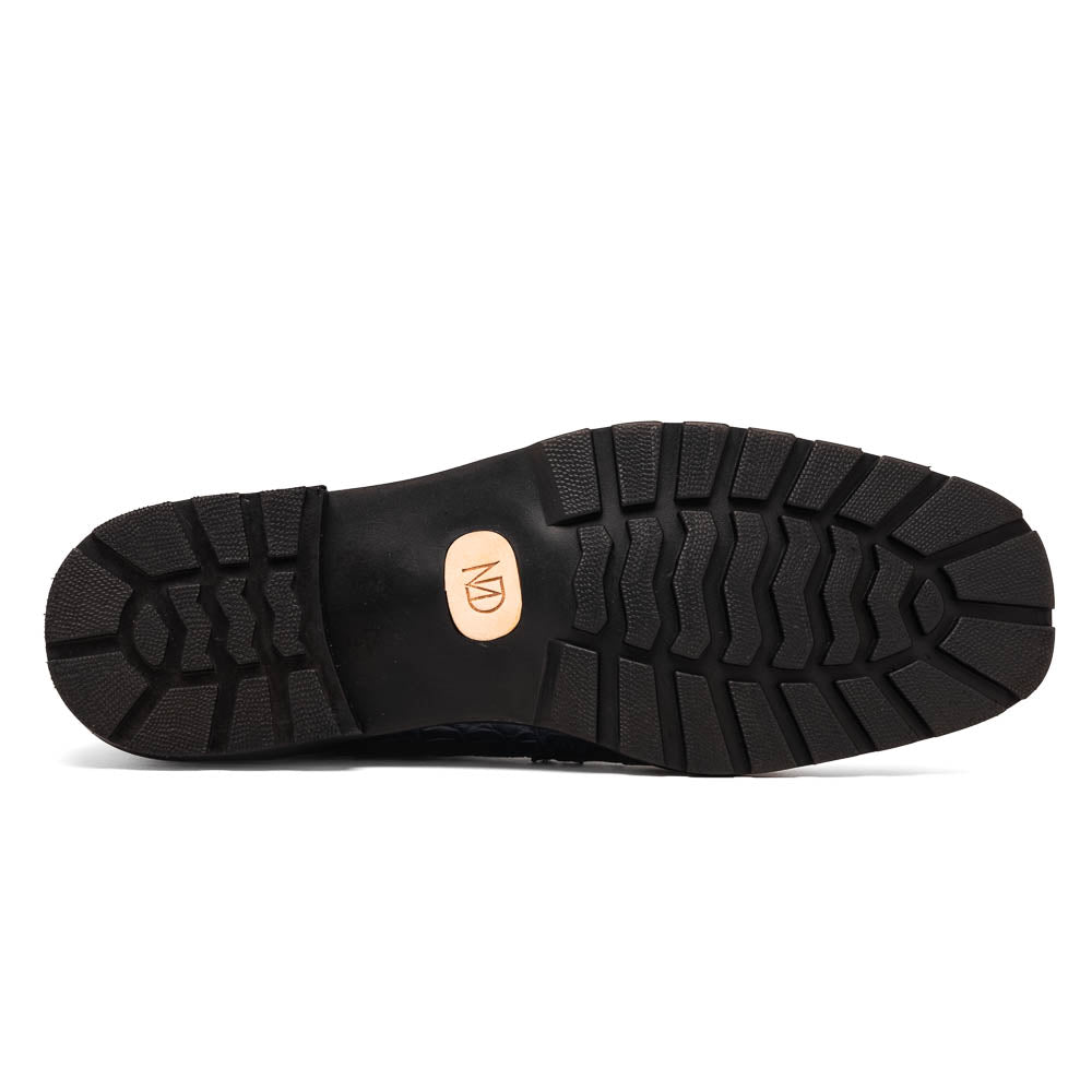 The Martinelli Navy by Marco Di Milano are genuine caiman crocodile boots in dark blue with a lace-up design and rugged black soles—perfect for men who love exotic footwear.