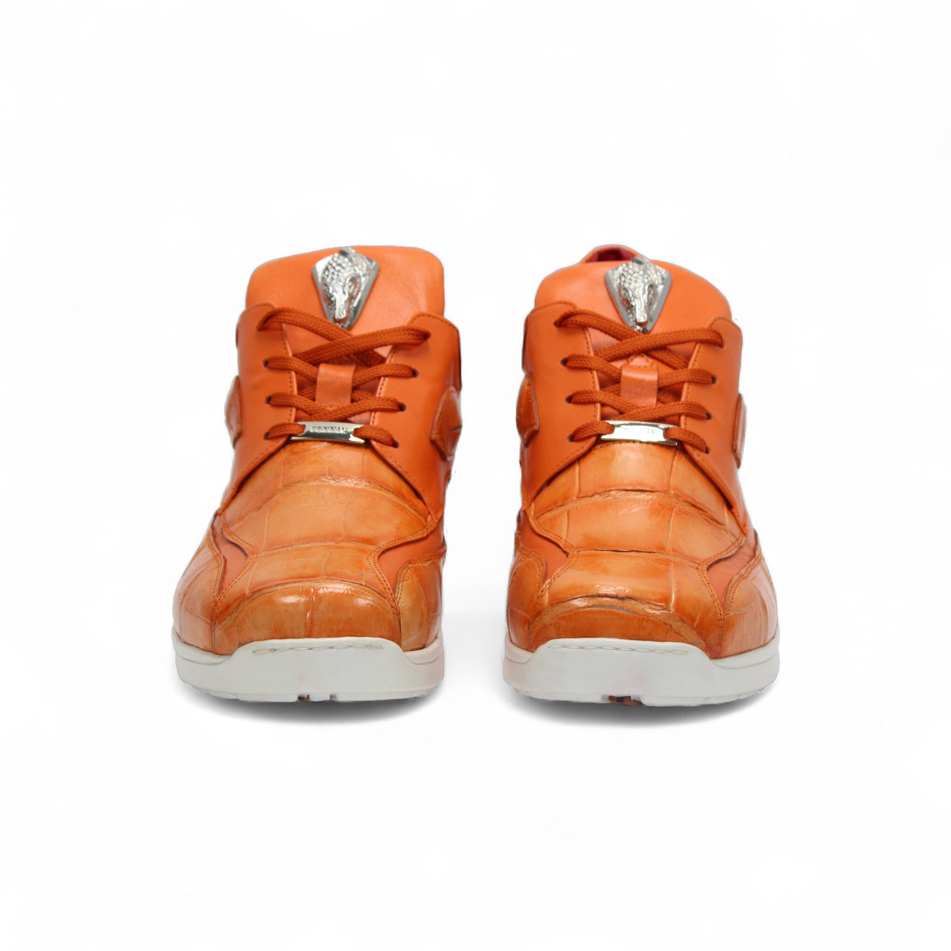 The Fennix Mason Orange by Fennix of Italy is an Italian leather sneaker with a white sole, side cut-out, and lace-up closure—a modern footwear choice to elevate your everyday style.