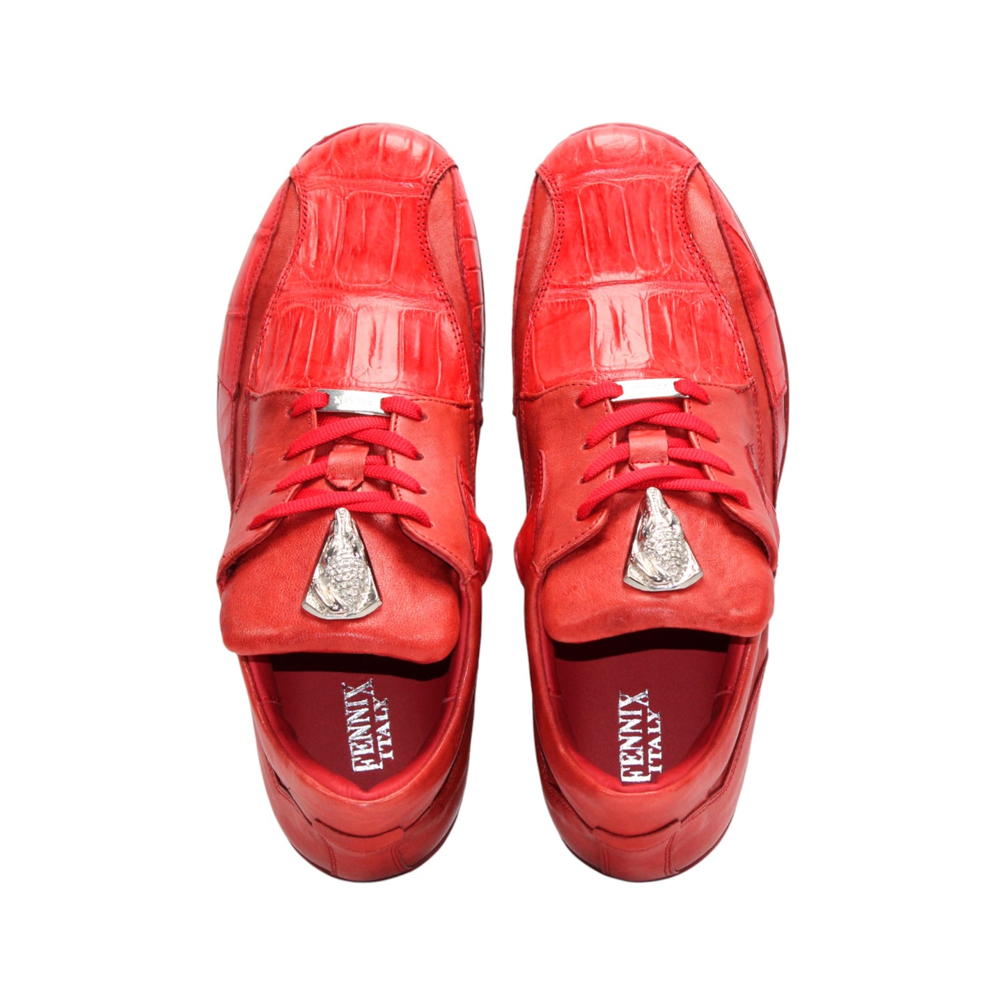 The Fennix Mason Red by Fennix of Italy is a modern red leather athletic shoe with laces and a tongue emblem, displayed in side profile on a white background.