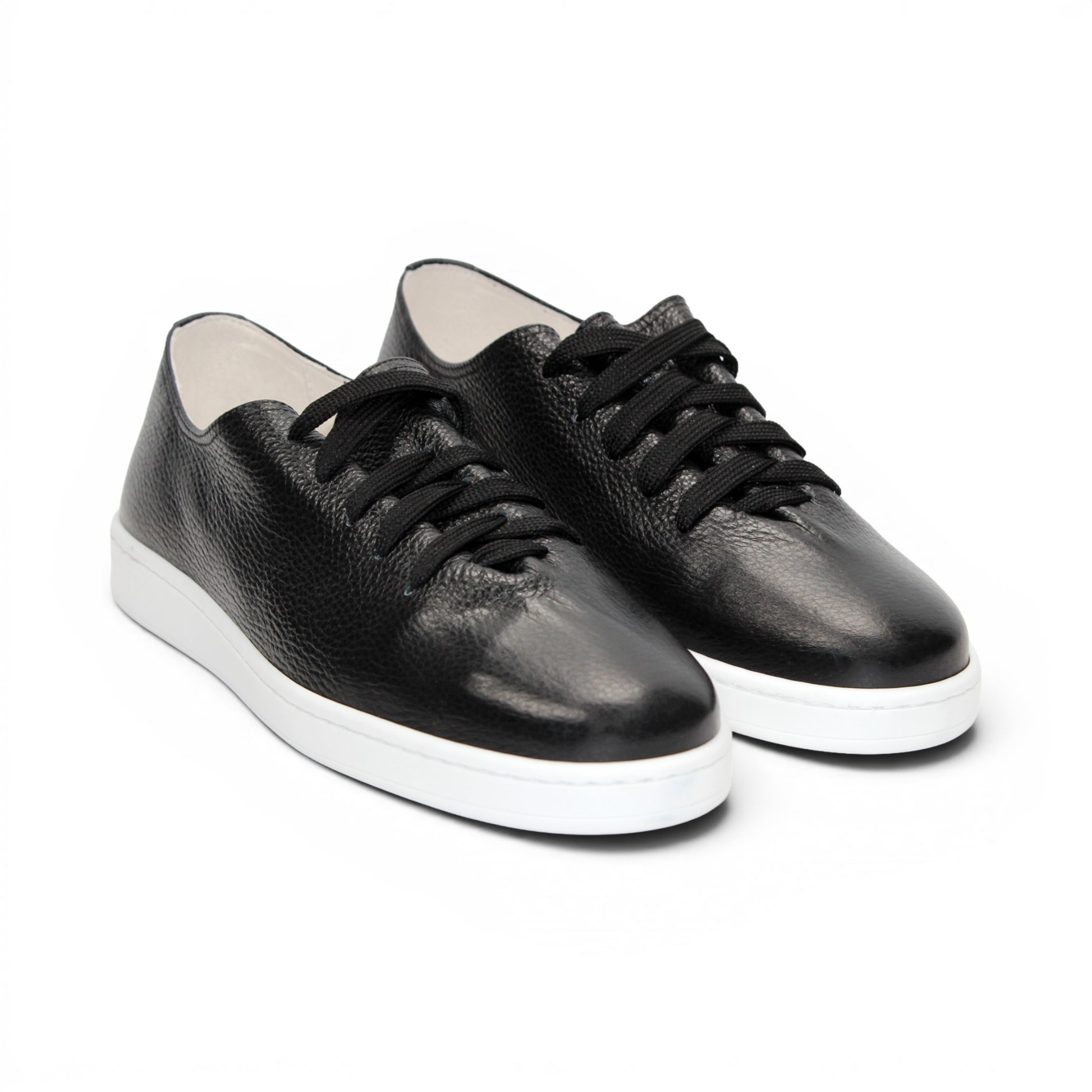The Duca Di Matiste Duca Max Black is a modern black Italian Dollaro leather sneaker with black laces and a white rubber sole, displayed in side profile against a white background.