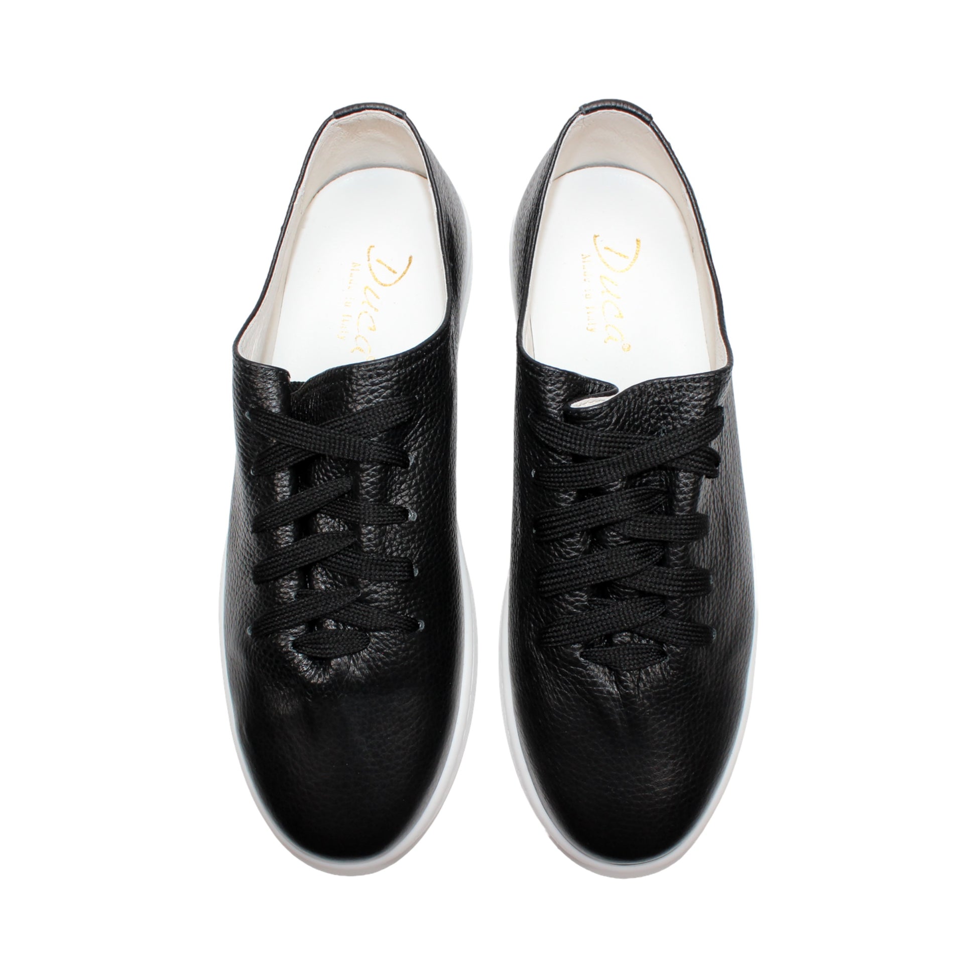 The Duca Di Matiste Duca Max Black is a modern black Italian Dollaro leather sneaker with black laces and a white rubber sole, displayed in side profile against a white background.
