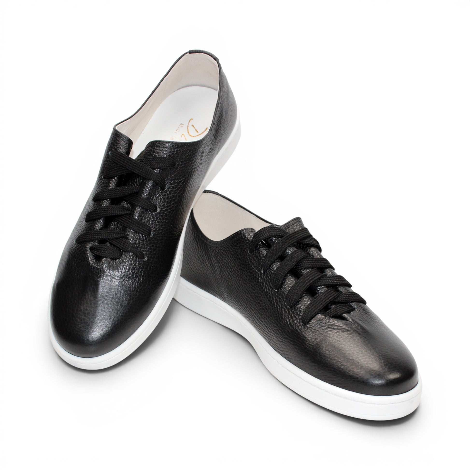 The Duca Di Matiste Duca Max Black is a modern black Italian Dollaro leather sneaker with black laces and a white rubber sole, displayed in side profile against a white background.