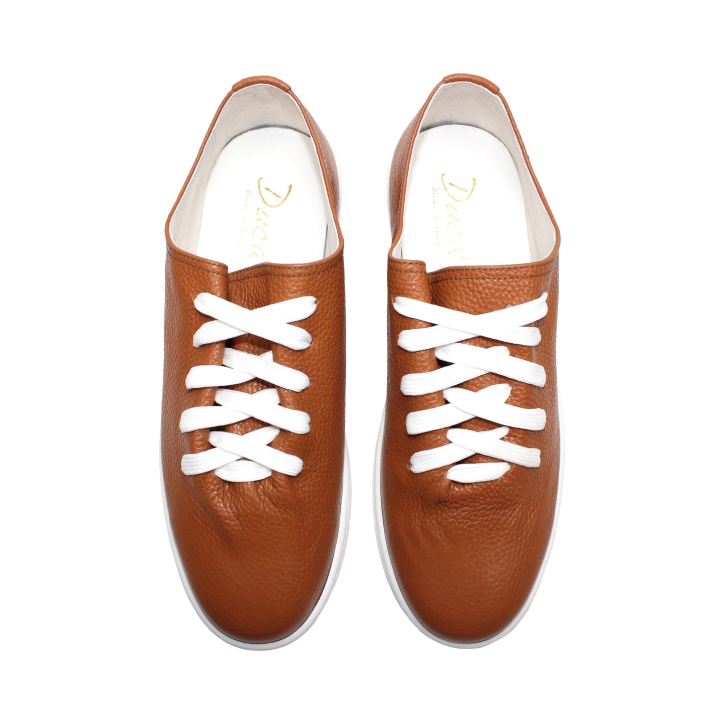 The Duca Max Camel by Duca Di Matiste—a brown Italian leather sneaker with white laces and a white rubber sole—offers a refined, contemporary look, shown in profile against a plain white background.