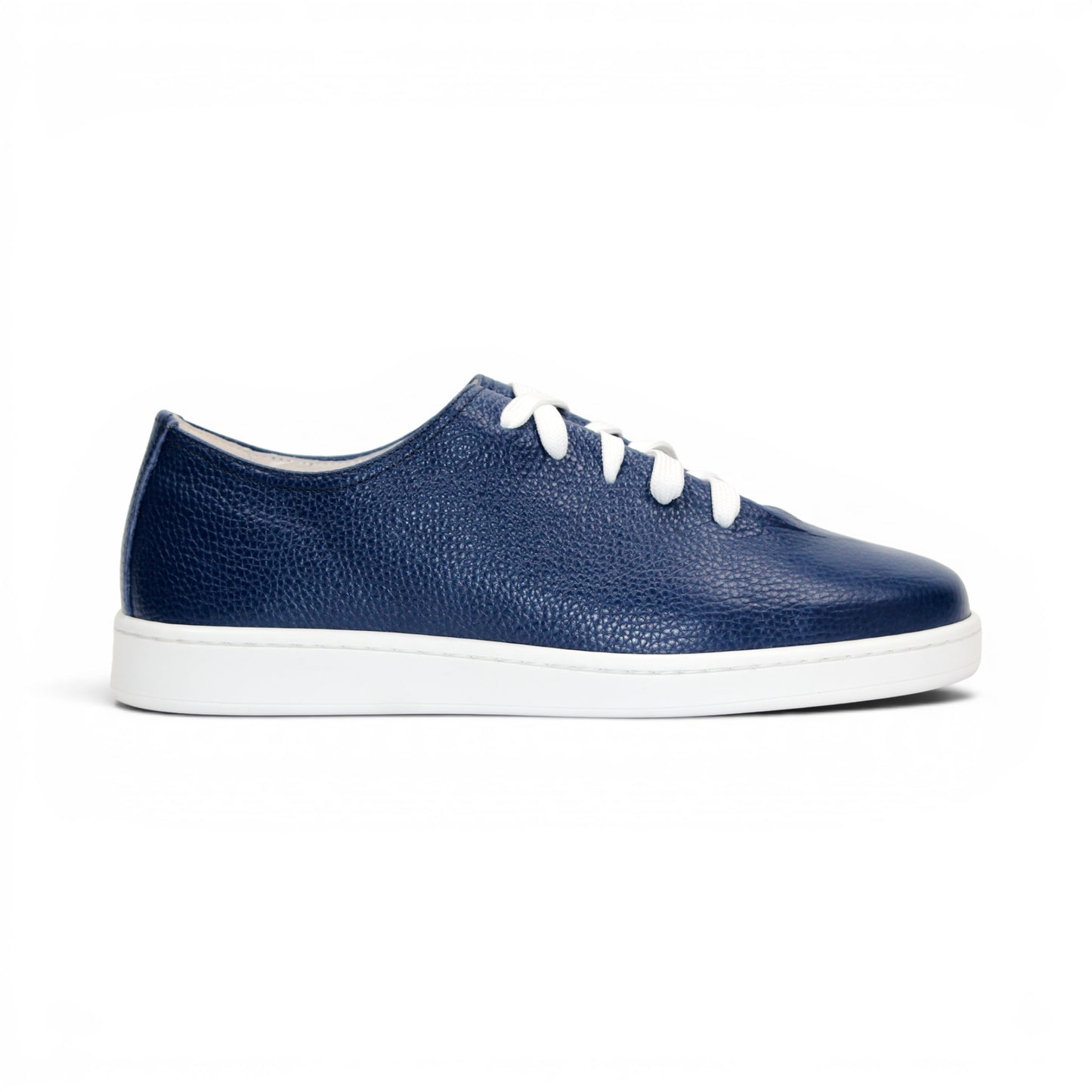 The Duca Max Jeans sneaker by Duca Di Matiste, made from premium navy blue Italian Dollaro leather, features white laces and a white rubber sole, shown in side profile against a plain white background for a modern casual look.