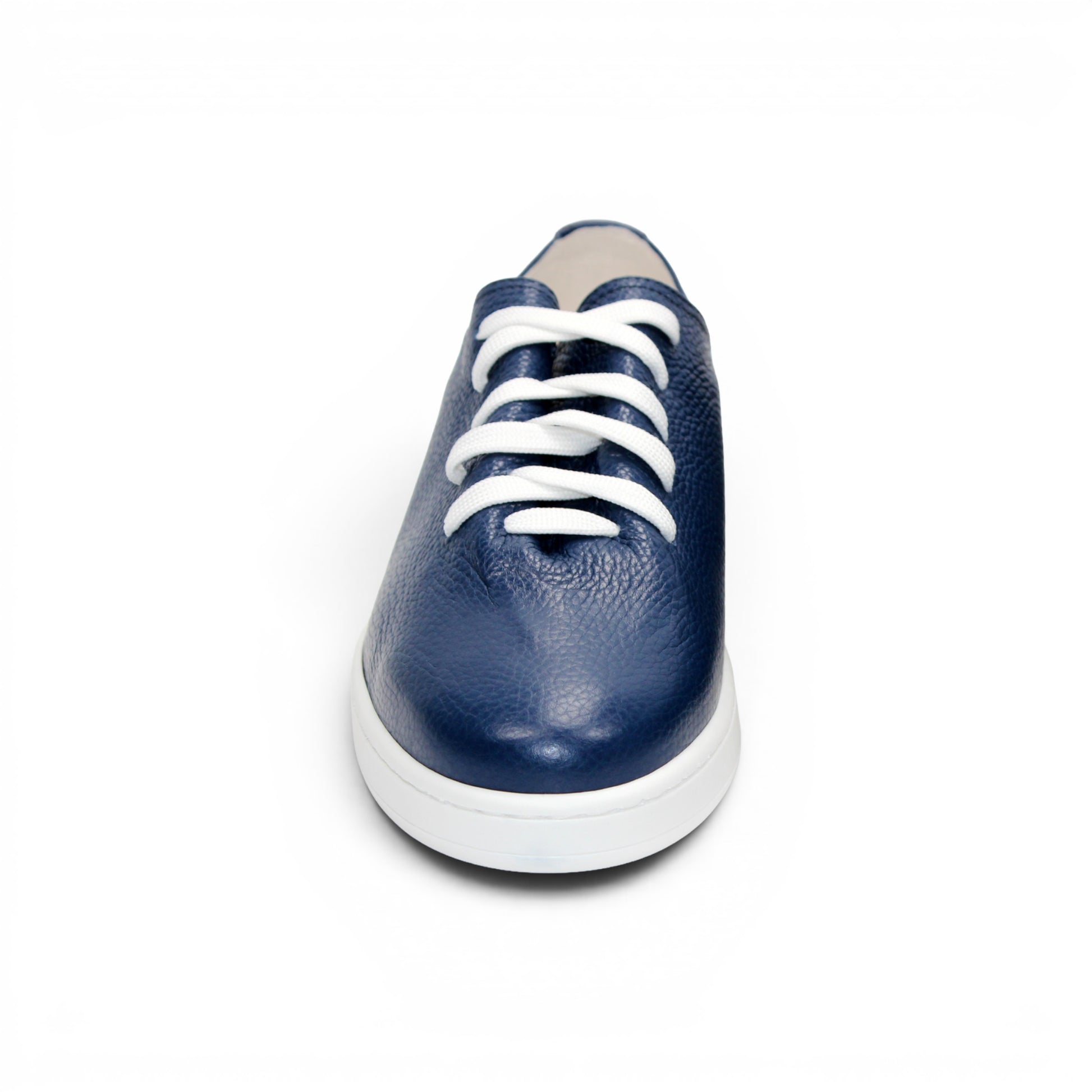 The Duca Max Jeans sneaker by Duca Di Matiste, made from premium navy blue Italian Dollaro leather, features white laces and a white rubber sole, shown in side profile against a plain white background for a modern casual look.