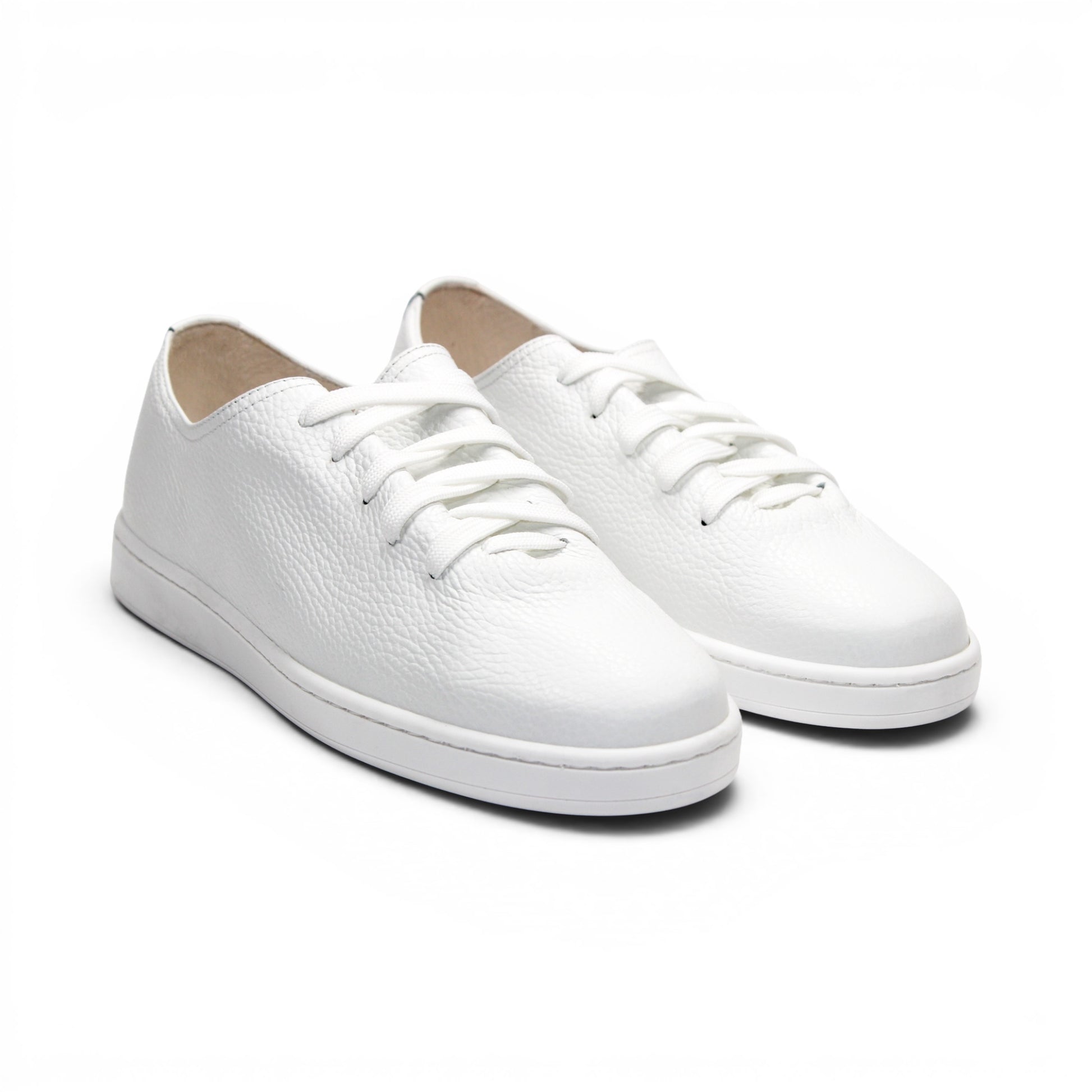 The Duca Max White by Duca Di Matiste is a low-top sneaker with white laces and a textured premium Dollaro leather upper, shown in profile against a white background—ideal for modern casual style.