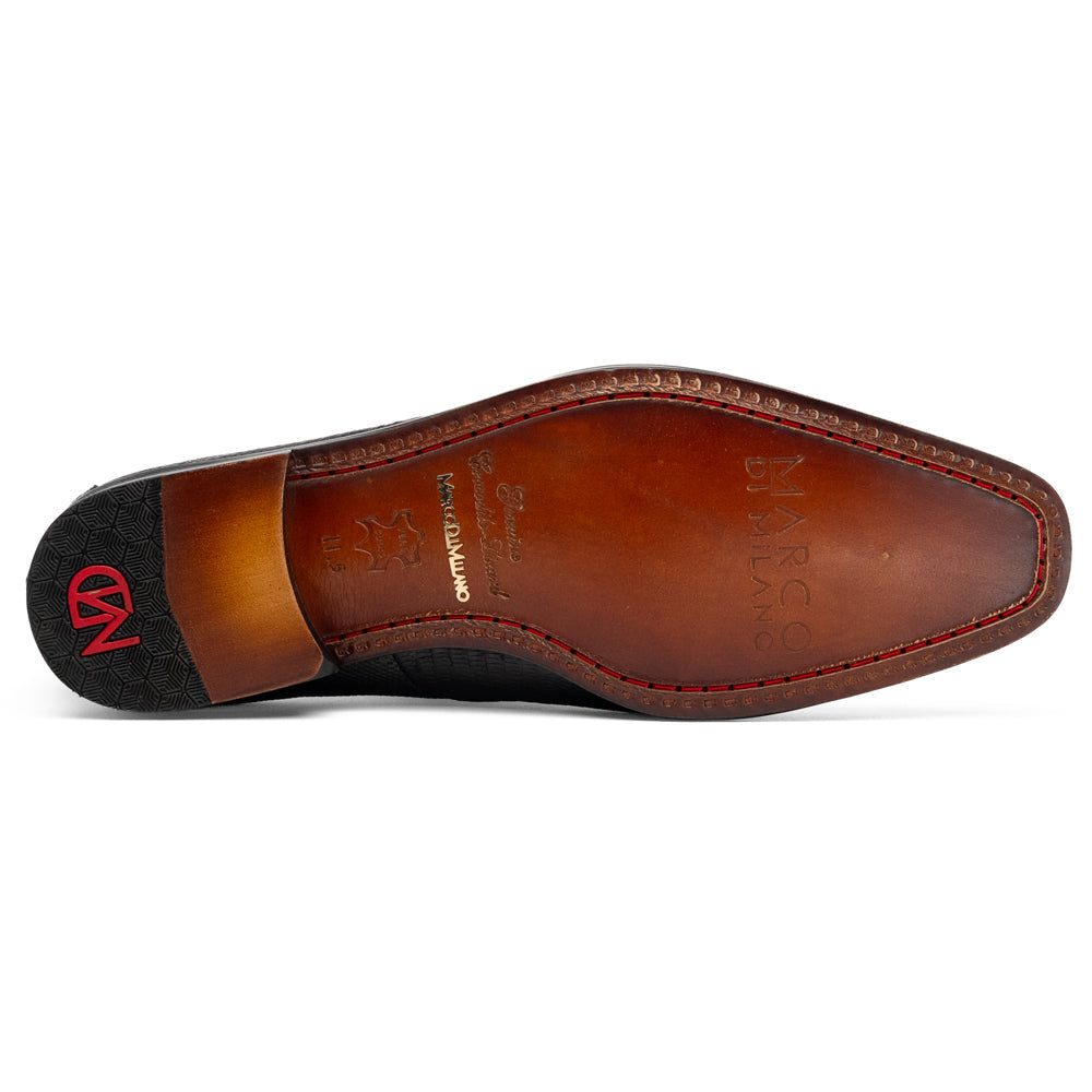 A pair of Merida Black dress derby shoes by Marco Di Milano, crafted from textured black leather caiman—one upright and one on its side revealing the brown sole stamped with the brand’s logo—an unmistakable statement in luxury footwear.