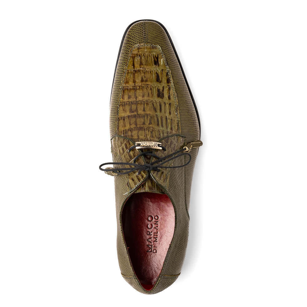 The Merida Olive Green by Marco Di Milano is a pair of olive green textured leather caiman Derby shoes with black laces, red interior lining, dark soles, embossed branding, and hand-painted finishes—a true luxury statement.