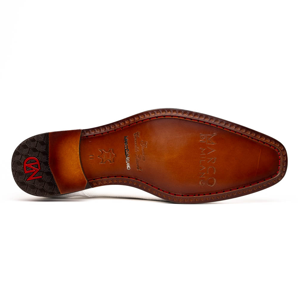 The Merida White by Marco Di Milano: luxury white textured leather caiman derby shoes with black soles, black laces, and brown leather outsoles, displayed with one shoe on its side.