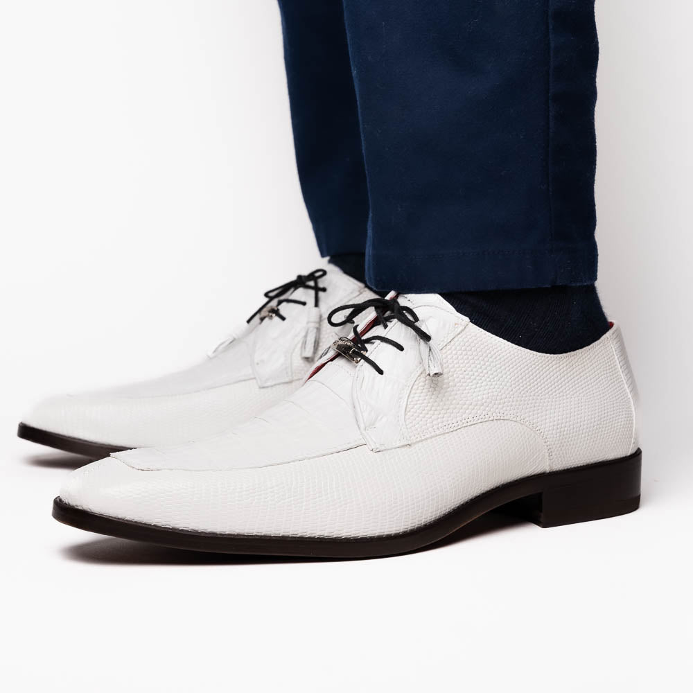 The Merida White by Marco Di Milano: luxury white textured leather caiman derby shoes with black soles, black laces, and brown leather outsoles, displayed with one shoe on its side.