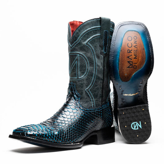 The Missouri Black / Blue boots by Marco Di Milano are handcrafted men's cowboy boots in black and blue, featuring genuine python skin and a textured snakeskin pattern—one boot upright, the other revealing the branded sole.