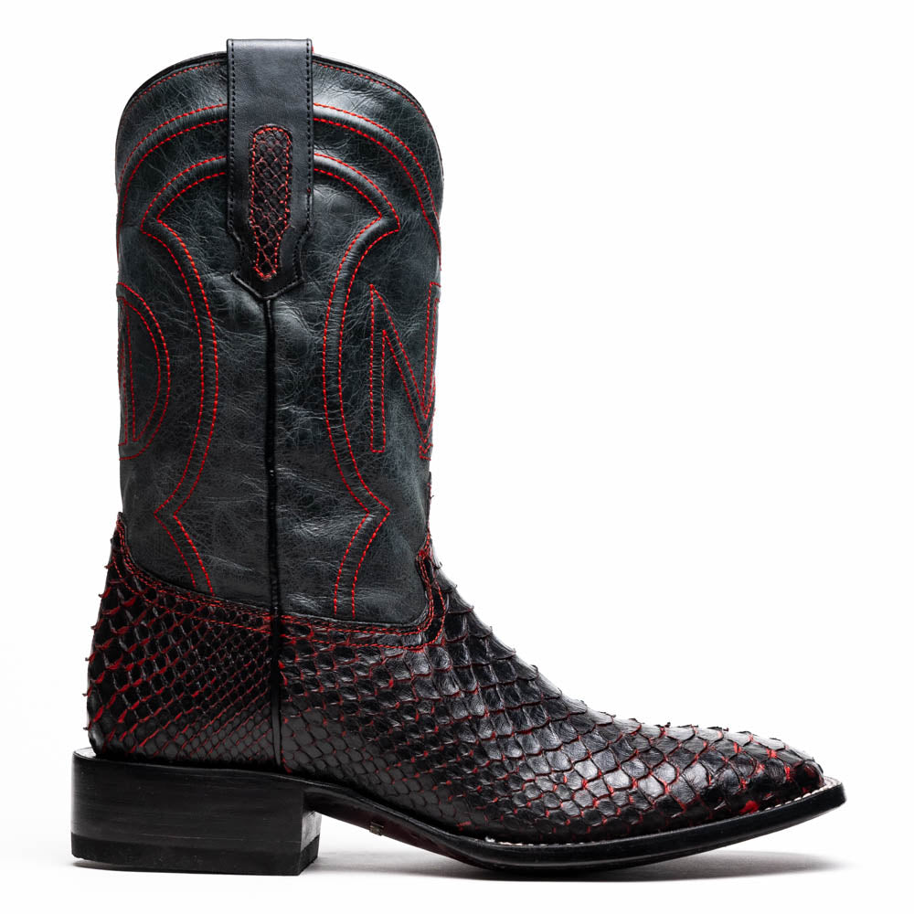 The Missouri BlackCherry by Marco Di Milano are handcrafted men's cowboy boots in black and red with a striking snakeskin texture, decorative stitching, and the sole stamped "Marco Di Milano." One boot is shown upright; the other displays the sole.
