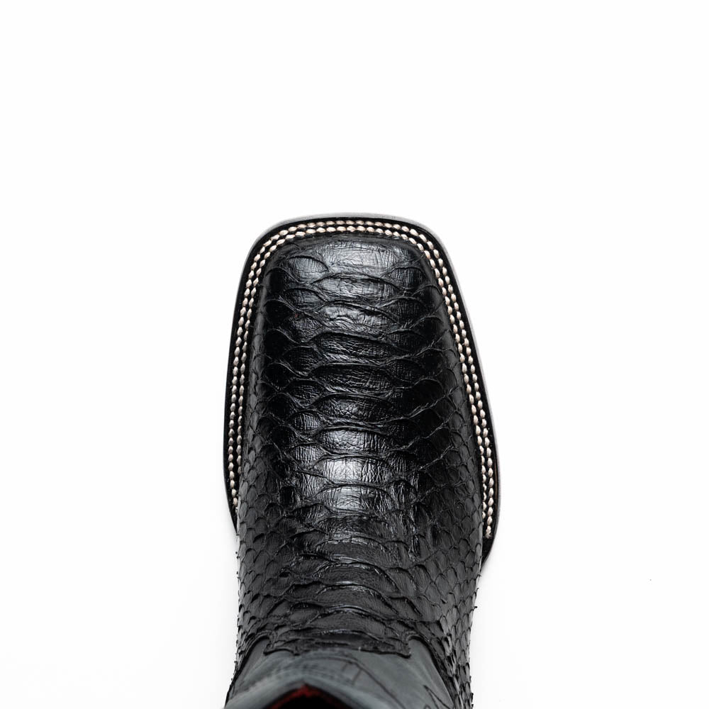 Missouri Black by Marco Di Milano: black, textured handcrafted men's boots with a red interior lining. One boot stands upright, the other shows the "MARCO DI MILANO" sole—exotic western boots for a bold statement.