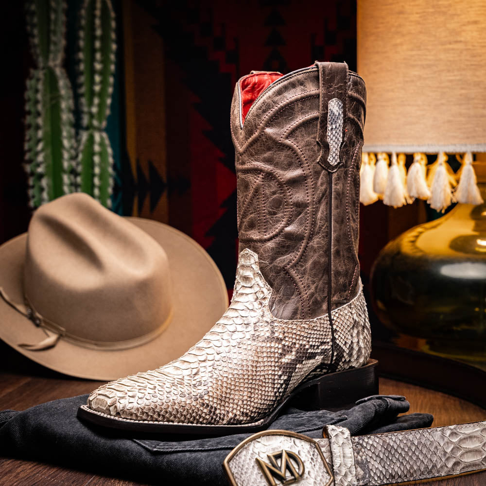 The Missouri Natural by Marco Di Milano: handcrafted men's cowboy boots with a snakeskin texture and brown shaft, featuring a sole stamped with the brand—distinctive exotic western boots.
