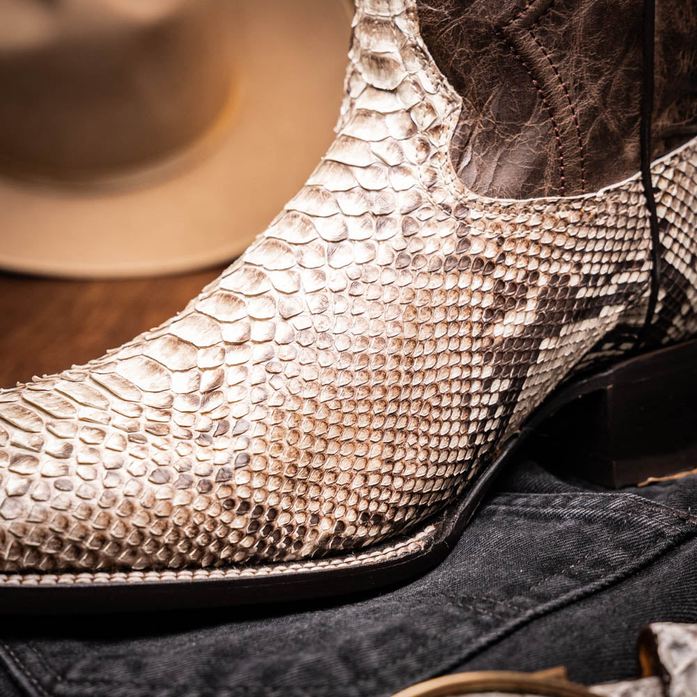The Missouri Natural by Marco Di Milano: handcrafted men's cowboy boots with a snakeskin texture and brown shaft, featuring a sole stamped with the brand—distinctive exotic western boots.