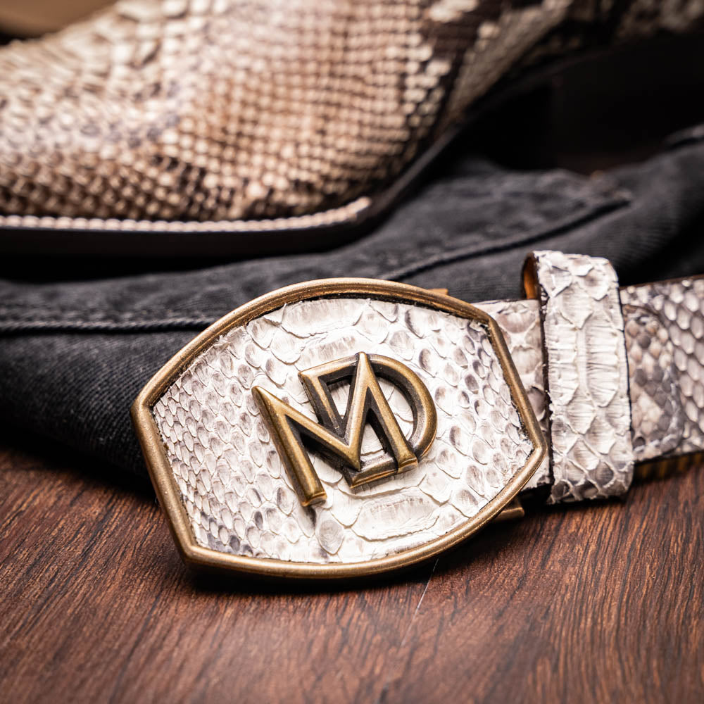 The Missouri Natural by Marco Di Milano: handcrafted men's cowboy boots with a snakeskin texture and brown shaft, featuring a sole stamped with the brand—distinctive exotic western boots.