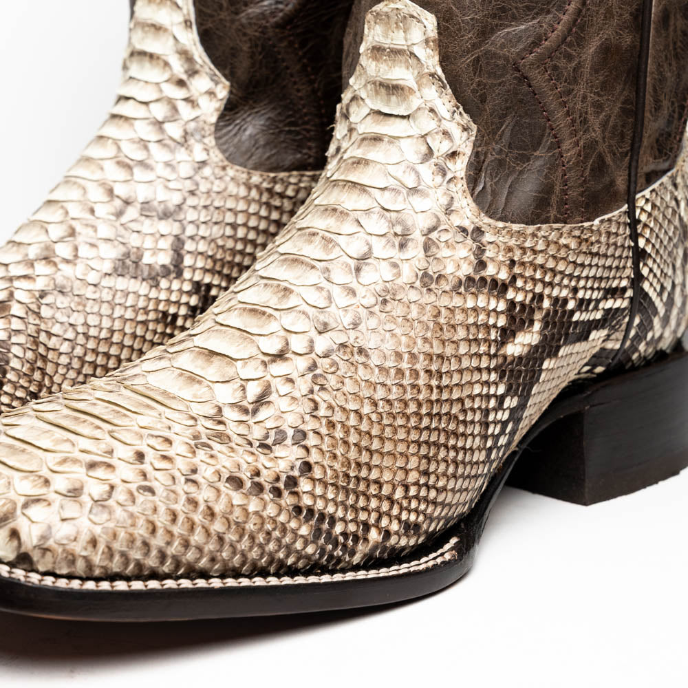 The Missouri Natural by Marco Di Milano: handcrafted men's cowboy boots with a snakeskin texture and brown shaft, featuring a sole stamped with the brand—distinctive exotic western boots.