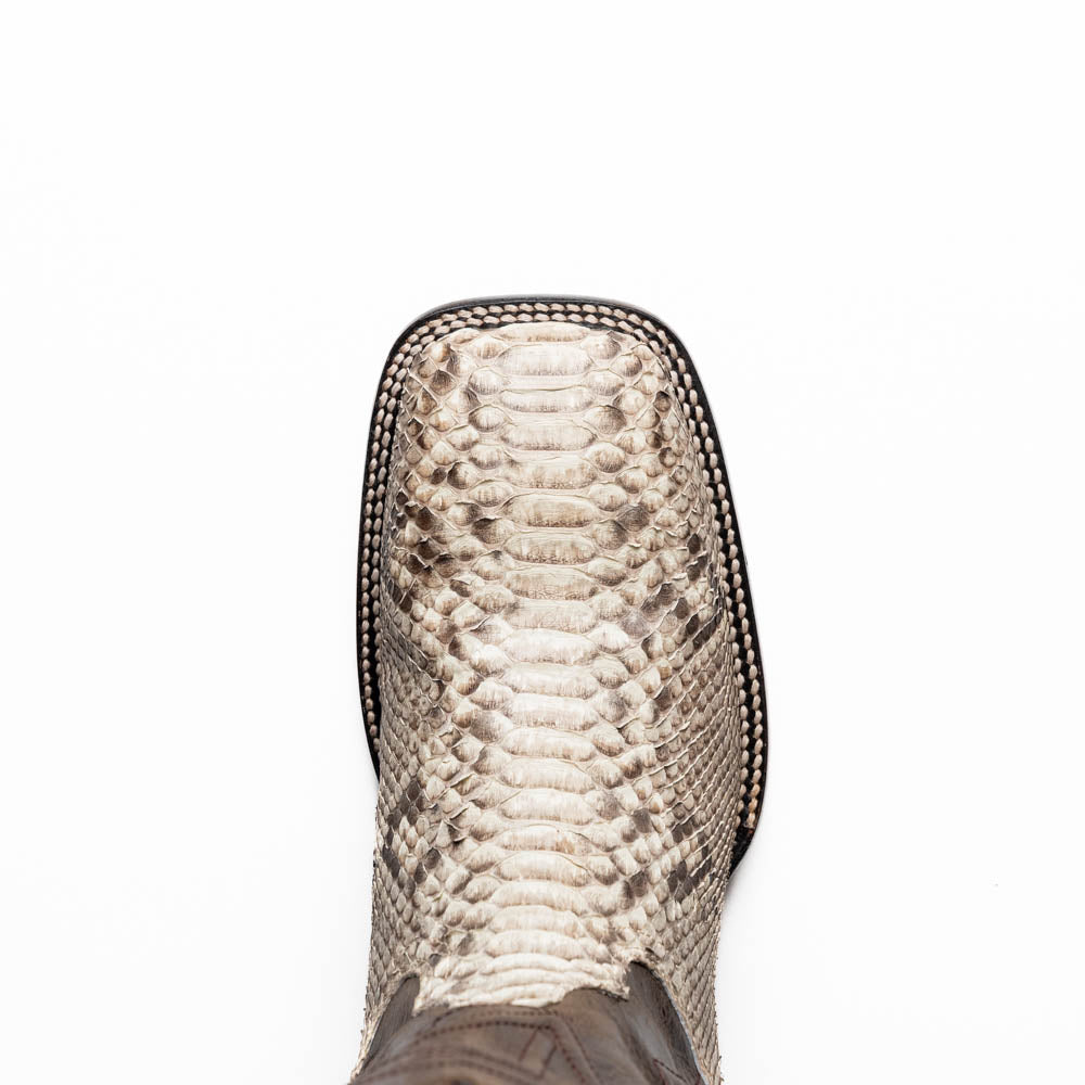 The Missouri Natural by Marco Di Milano: handcrafted men's cowboy boots with a snakeskin texture and brown shaft, featuring a sole stamped with the brand—distinctive exotic western boots.