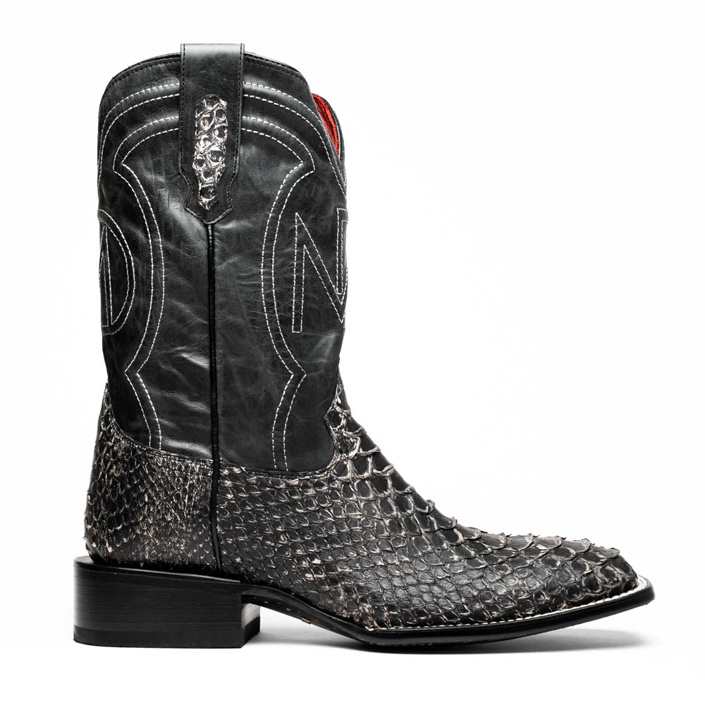 A pair of Missouri Stone White cowboy boots by Marco Di Milano, handcrafted in black textured python leather with branded soles, displayed on a white background.