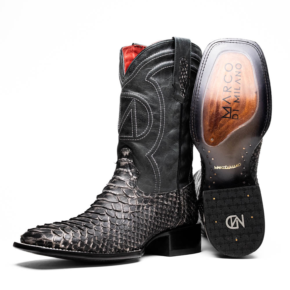 A pair of Missouri Stone White cowboy boots by Marco Di Milano, handcrafted in black textured python leather with branded soles, displayed on a white background.