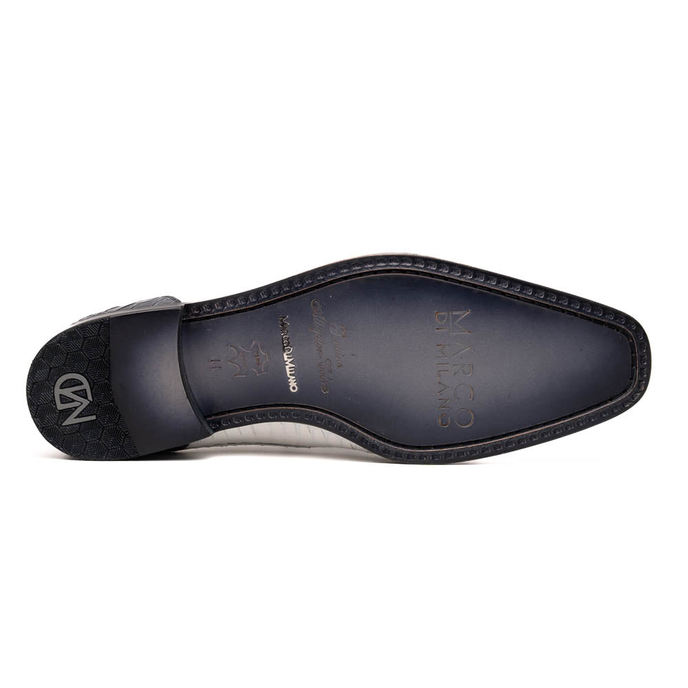 The Marco Di Milano Moncalieri Gray / White men's dress shoes feature a luxury white and grey crocodile pattern, black laces, and black soles, with one shoe stylishly propped against the other.